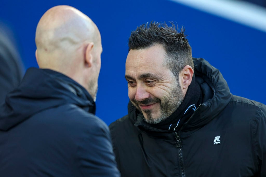 Head Coach Erik ten Hag of Manchester United with Head Coach Roberto De Zerbi of Brighton & Hove Albion during the Premier League match between...