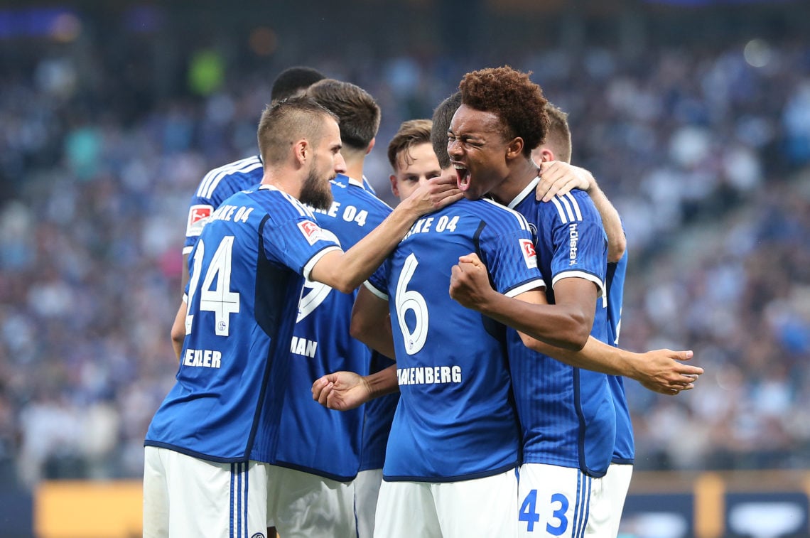 Assan Ouedraogo of FC Schalke 04 celebrates with his teammates after scoring the team's first goal during the Second Bundesliga match between Hambu...
