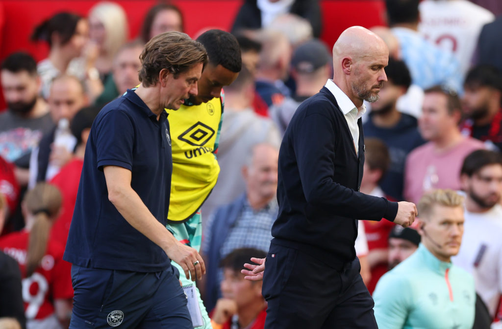 Thomas Frank, Manager of Brentford, and Erik ten Hag, Manager of Manchester United, leave the pitch at half time during the Premier League match be...