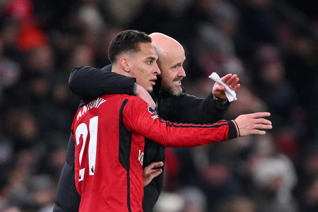 Antony of Manchester United receives instructions from Manager Erik ten Hag during the Premier League match between Manchester United and Chelsea F...