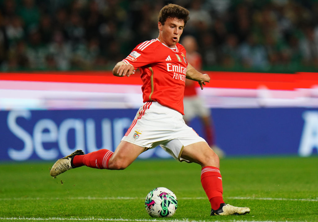 Joao Neves of SL Benfica in action during the Liga Portugal Betclic match between Sporting CP and SL Benfica at Estadio Jose Alvalade on April 6, 2...