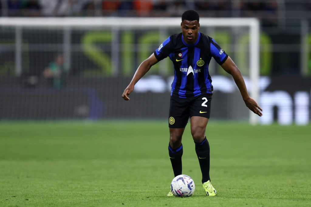 Denzel Dumfries of FC Internazionale controls the ball during the Serie A TIM match between FC Internazionale and Cagliari at Stadio Giuseppe Meazz...