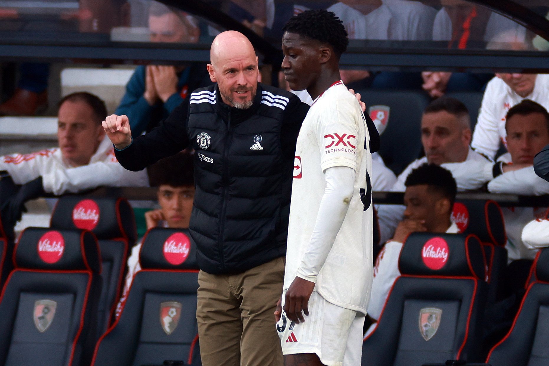 Erik ten Hag Manager/Head Coach of Manchester United with Kobbie Mainoo of ...