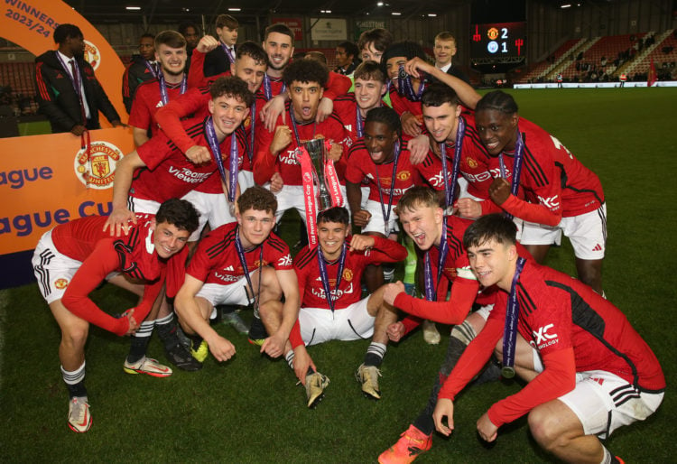 Ethan Wheatley of Manchester United & his team-mates celebrate victory with the trophy at the end of the U18 Premier League Cup Final match bet...