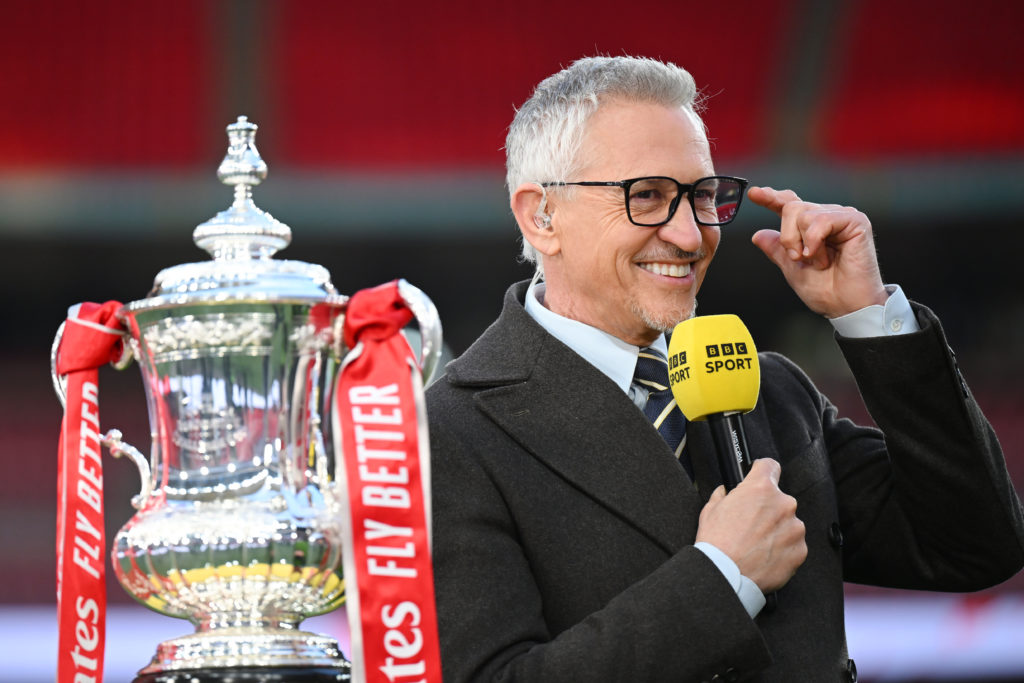 BBC presenter Gary Lineker looks on with the FA Cup trophy after the Emirates FA Cup Semi Final match between Manchester City and Chelsea at Wemble...