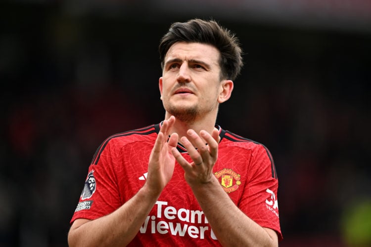 Harry Maguire of Manchester United applauds the fans after the Premier League match between Manchester United and Burnley FC at Old Trafford on Apr...