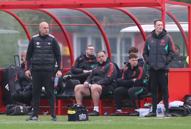 Manchester United U18 Head Coach Adam Lawrence looks on with Phil Jones during the U18 Premier League match between Manchester United U18 and Evert...