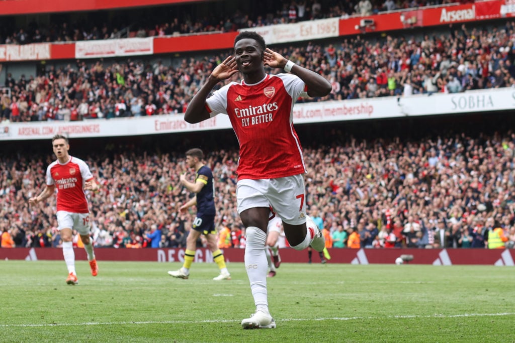 Bukayo Saka of Arsenal celebrates their first goal during the Premier League match between Arsenal FC and AFC Bournemouth at Emirates Stadium on Ma...