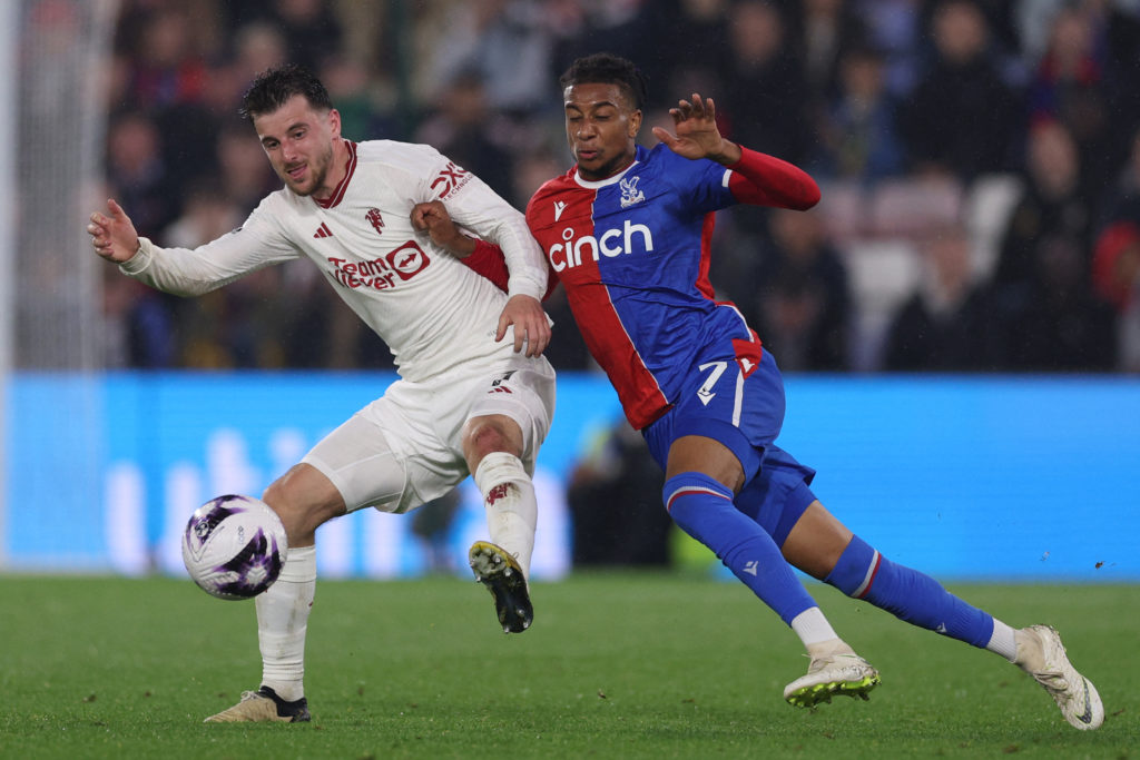 Manchester United's English midfielder #07 Mason Mount (L) vies with Crystal Palace's French midfielder #07 Michael Olise (R) during the English Pr...