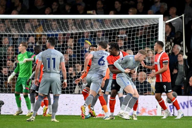 Teden Mengi of Luton Town brings down Jarrad Branthwaite of Everton inside the box, leading to a penalty awarded to Everton, during the Premier Lea...