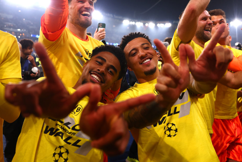Jadon Sancho (R) of Borussia Dortmund celebrates at full-time with team-mate Ian Maatsen following the UEFA Champions League semi-final second leg ...