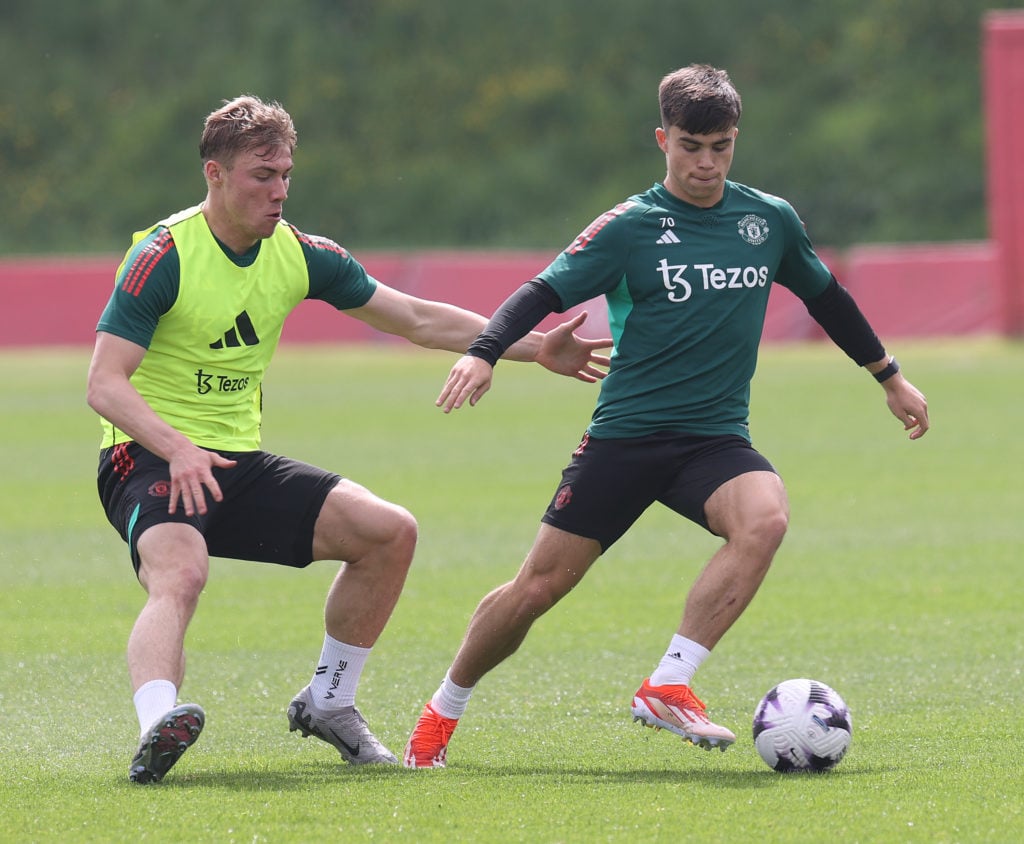 (EXCLUSIVE COVERAGE)  Rasmus Hojlund, Harry Amass of Manchester United in action during a first team training session at Carrington Training Ground...