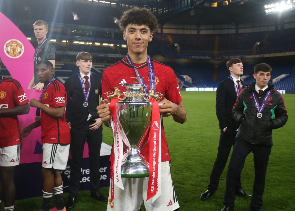 Ethan Wheatley of Manchester United U18 celebrates holding aloft The U18 Premier League National Final Trophy after the U18 Premier League Final be...