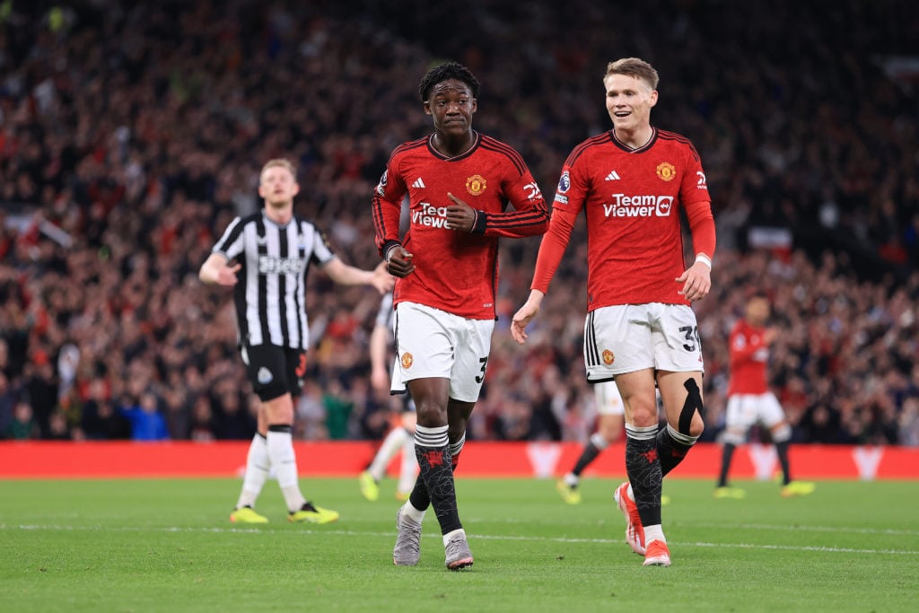 Kobbie Mainoo of Manchester United (L) celebrates with Scott McTominay of Manchester United after scoring their 1st goal during the Premier League ...