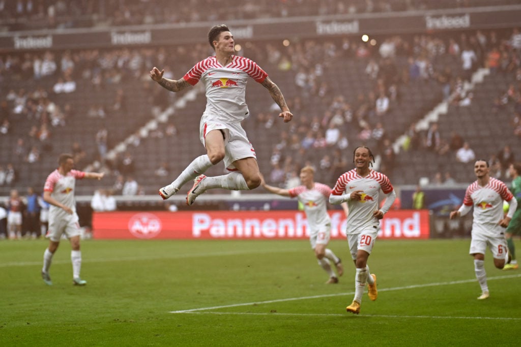 Leipzig's Slovenian forward #30 Benjamin Sesko celebrates scoring the second goal during the German first division Bundesliga football match between Eintracht Frankfurt and RB Leipzig in Frankfurt am Main, western Germany on May 18, 2024