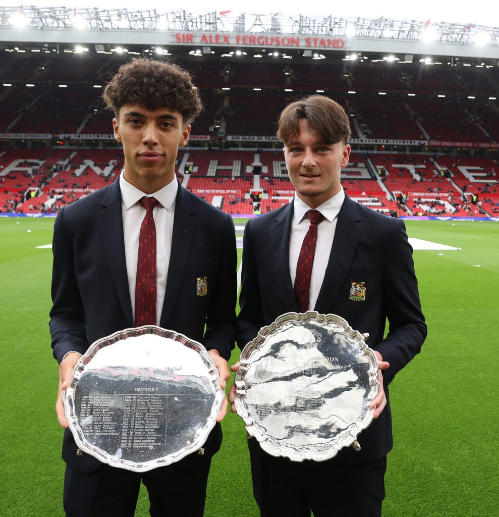 Ethan Wheatley and Elyh Harrison of Manchester United pose with the Jimmy Murphy Young Player of the Year award and the Denzil Haroun Reserve Team ...