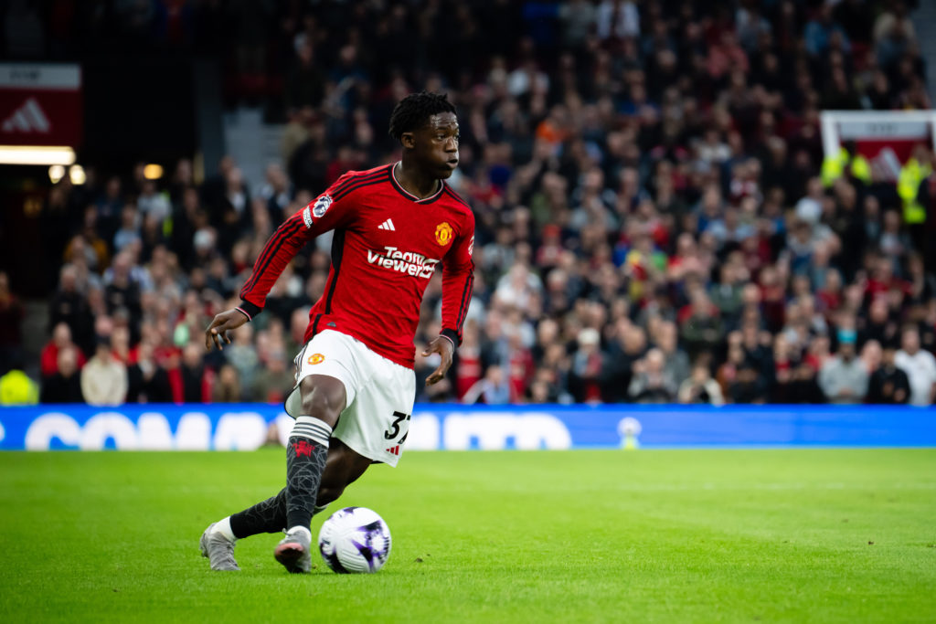 Manchester United's Kobbie Mainoo in action during the Premier League match between Manchester United and Newcastle United at Old Trafford on May...