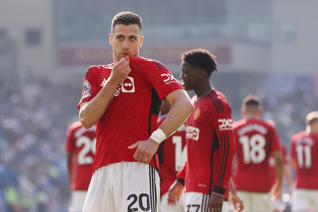 Diogo Dalot of Manchester United celebrates scoring his team's first goal during the Premier League match between Brighton & Hove Albion and Ma...