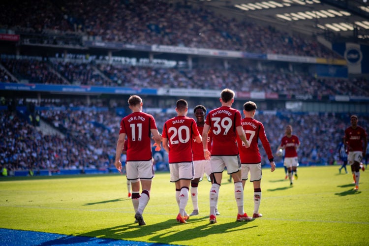 Diogo Dalot of Manchester United celebrates scoring their first goal during the Premier League match between Brighton & Hove Albion and Manches...