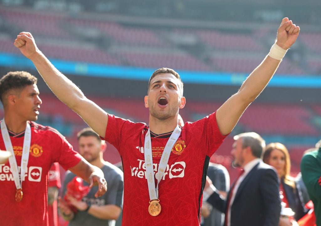 Diogo Dalot of Manchester United holds celebration after winning the Emirates FA Cup Final match between Manchester City and Manchester United at W...