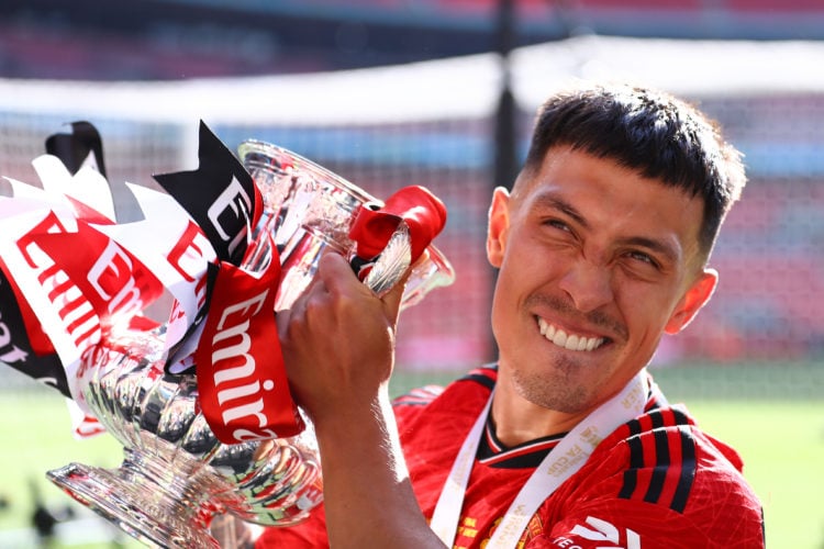 Lisandro Martinez of Manchester United celebrates with the FA Cup trophy during the Emirates FA Cup Final match between Manchester City and Manches...