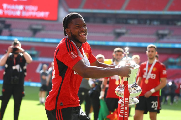 Willy Kambwala of Manchester United celebrates with the FA Cup Trophy during the Emirates FA Cup Final match between Manchester City and Manchester...