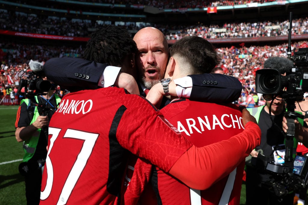 Erik ten Hag, Manager of Manchester United, celebrates with Kobbie Mainoo and Alejandro Garnacho of Manchester United after the team's victory in t...