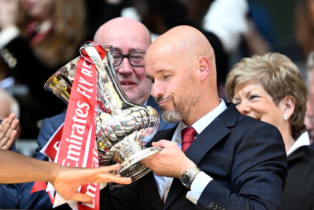 Erik ten Hag, Manager of Manchester United, lifts the Emirates FA Cup Trophy after his team's victory after the Emirates FA Cup Final match between...