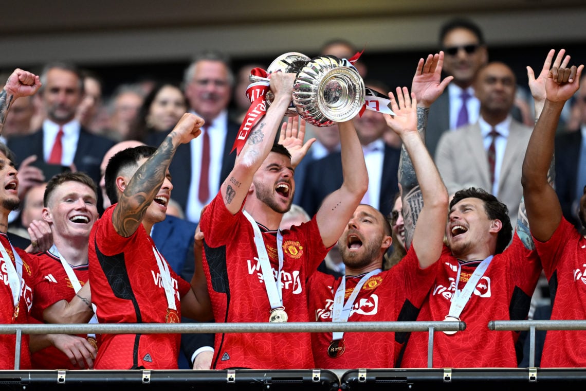 Mason Mount of Manchester United celebrates with the Emirates FA Cup Trophy after his team's victory after the Emirates FA Cup Final match between ...