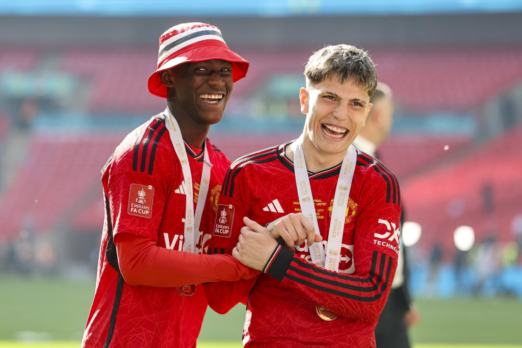 Kobbie Mainoo celebrates winning the FA Cup with Alejandro Garnacho