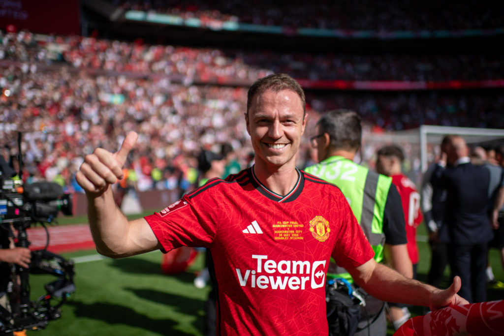 Manchester United's Jonny Evans celebrates winning the Emirates FA Cup Final match between Manchester City and Manchester United at Wembley Stadium...