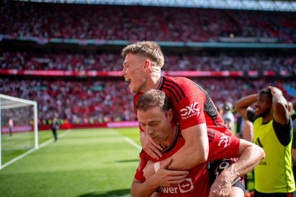 Scott McTominay and Jonny Evans of Manchester United celebrate winning the Emirates FA Cup Final match between Manchester City and Manchester Unite...