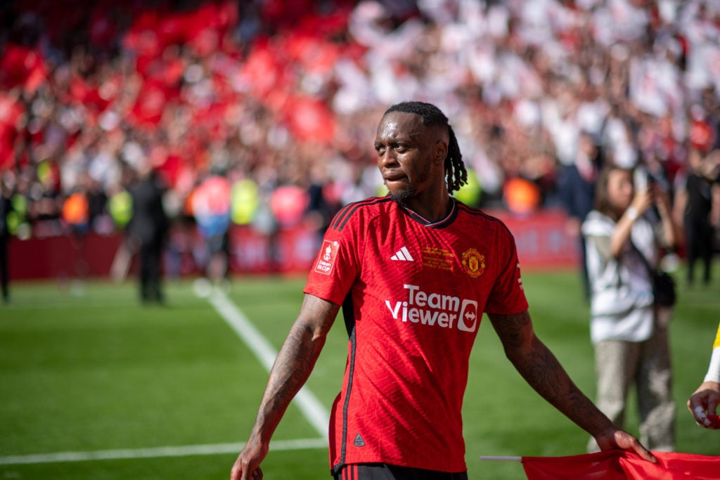 Manchester United's Aaron Wan-Bissaka celebrates winning the Emirates FA Cup Final match between Manchester City and Manchester United at Wembley...