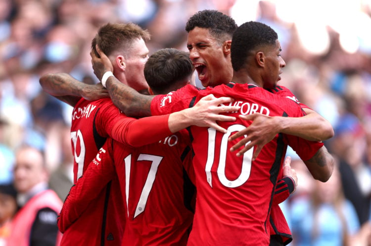 Raphael Varane of Manchester United celebrates after his team mate Alejandro Garnacho celebrates scoring his sides first goal during the Emirates F...