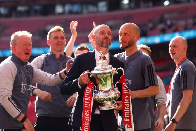 Erik ten Hag Manager/Head Coach of Manchester United celebrates with the trophy and assistant Steve McClaren after the Emirates FA Cup Final match ...