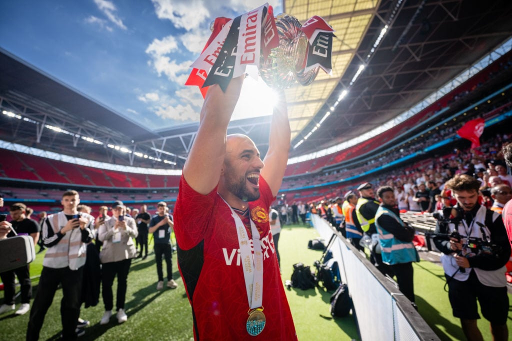 Sofyan Amrabat of Manchester United celebrates with the Emirates FA Cup trophy after winning the Emirates FA Cup Final match between Manchester Cit...