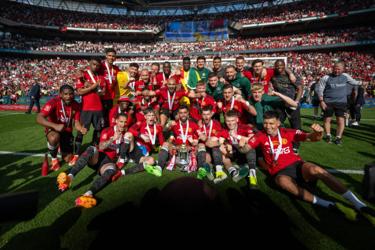 Manchester United players celebrate with the Emirates FA Cup trophy after winning the Emirates FA Cup Final match between Manchester City and Manch...