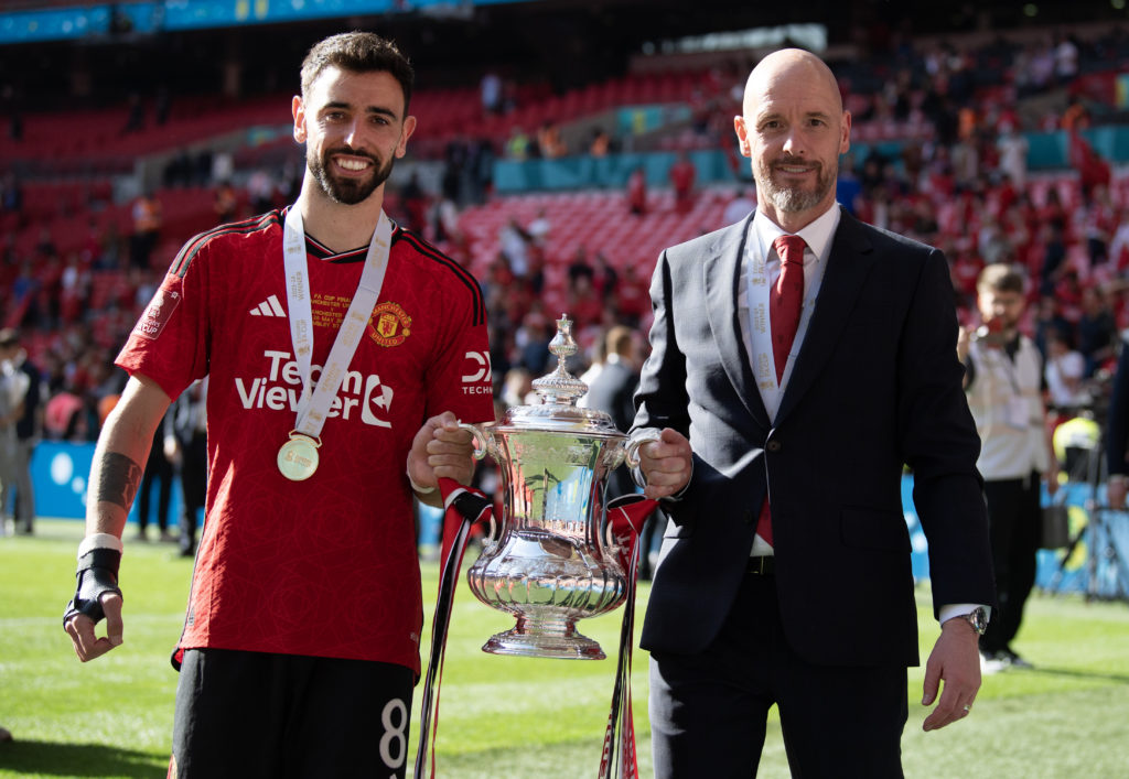 Manchester United manager Eric Ten Hag (left) and Bruno Fernandes celebrate winning the Emirates FA Cup Final match between Manchester City and Man...