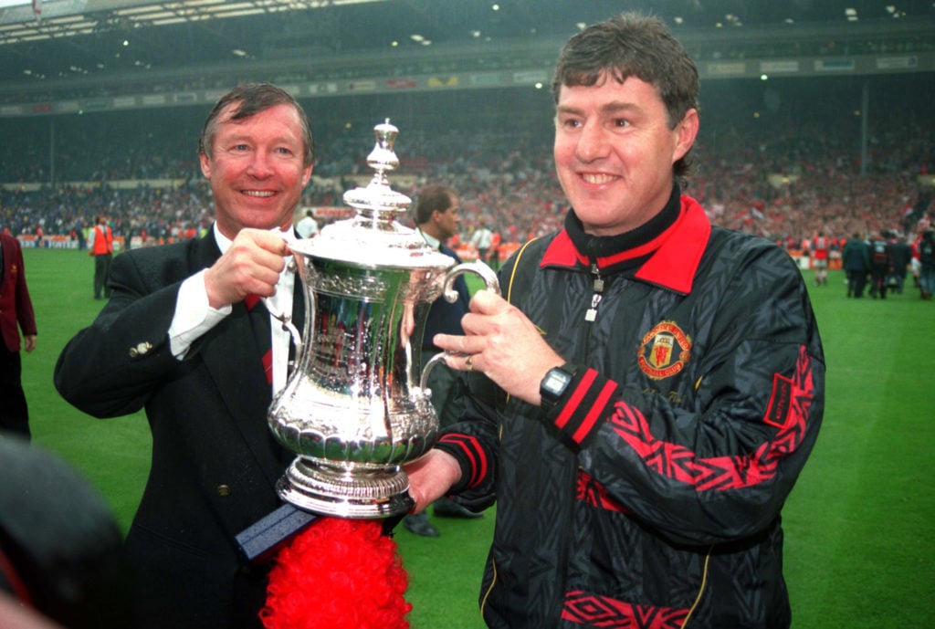 14th May 1994 FA Cup Final - Manchester United v Chelsea United manager and assistant manager Alex Ferguson and Brian Kidd celebrate with the cup.