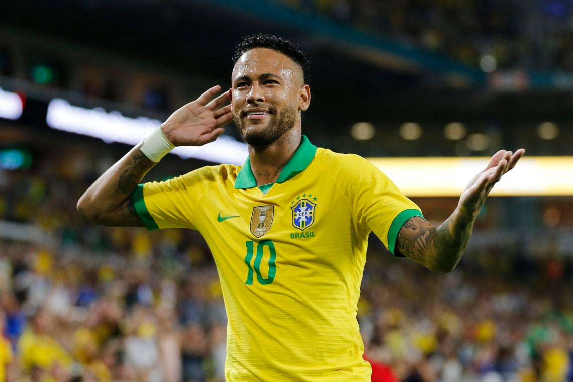 Neymar Jr. #10 of Brazil reacts after assisting Casemiro #5 on a goal against Colombia during the first half of the friendly at Hard Rock Stadium o...