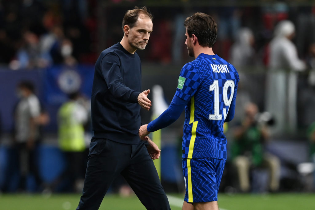 Mason Mount embraces Thomas Tuchel, Manager of Chelsea as he is substituted due to an injury during the FIFA Club World Cup UAE 2021 Final match be...