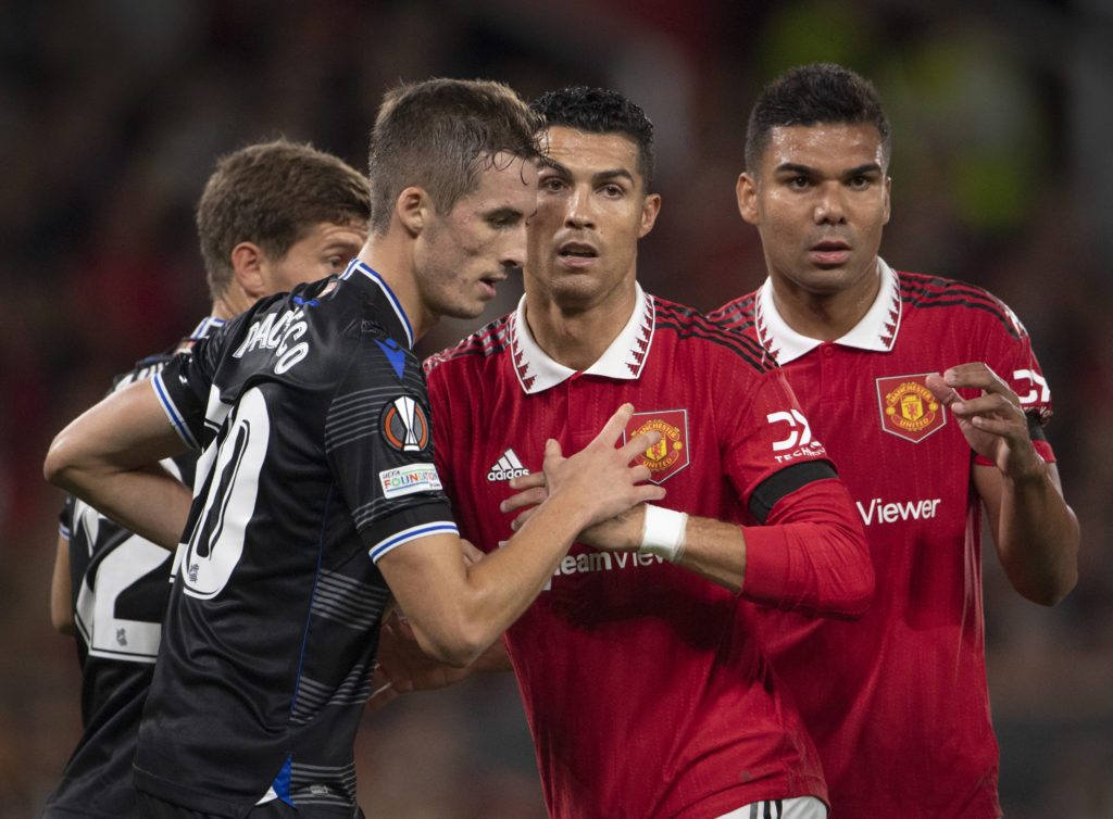 Cristiano Ronaldo and Casemiro of Manchester United with Jon Pacheco of Real Sociedad whilst waiting for a corner in action during the UEFA Europa ...