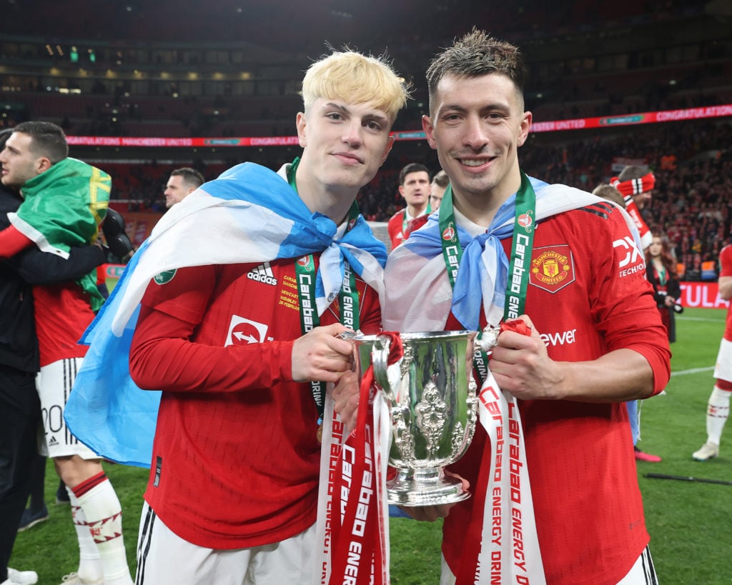 Alejandro Garnacho, Lisandro Martinez of Manchester United celebrate with the trophy after the Carabao Cup Final match between Manchester United an...