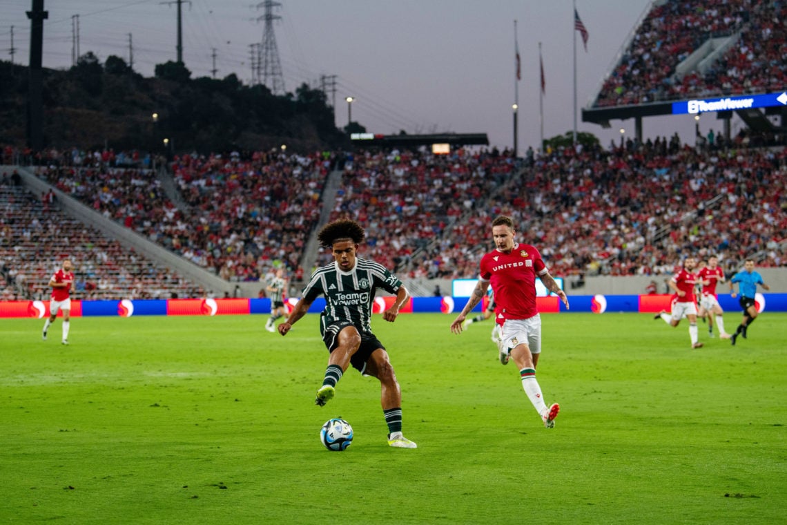 Shola Shoretire of Manchester United controls the ball whilst under pressure from Callum McFadzean of Wrexham during the pre-season friendly match ...