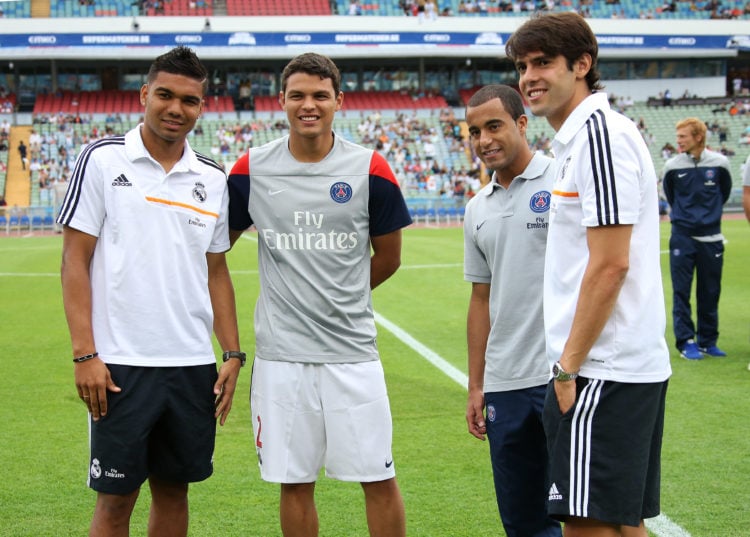 Carlos Casemiro of Real Madrid, Thiago Silva of PSG, Lucas Moura of PSG, Kaka of Real Madrid chat prior to the friendly match between Real Madrid a...