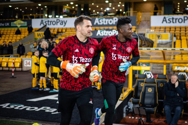 Tom Heaton and Andre Onana of Manchester United warm up ahead of the Premier League match between Wolverhampton Wanderers and Manchester United at ...