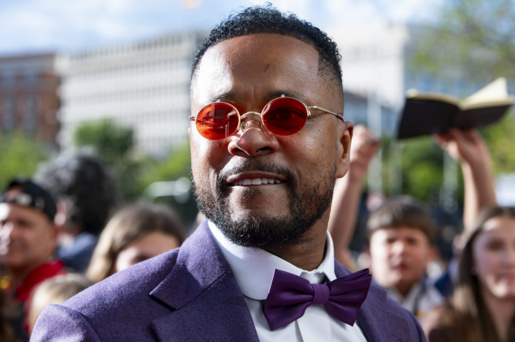 Patrice Evra greets and signs autographs to fans at Palacio De Cibeles on April 22, 2024 in Madrid, Spain.