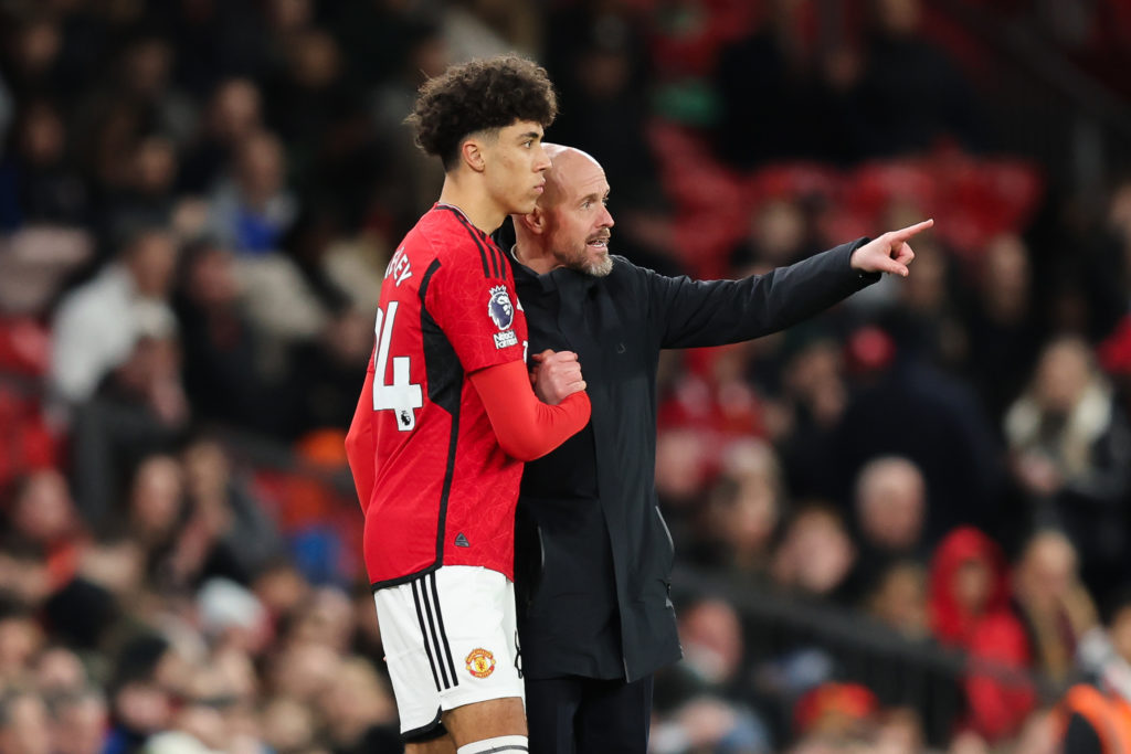 Erik ten Hag, Manager of Manchester United, gives instructions to Ethan Wheatley of Manchester United before being substituted on for his first team debut