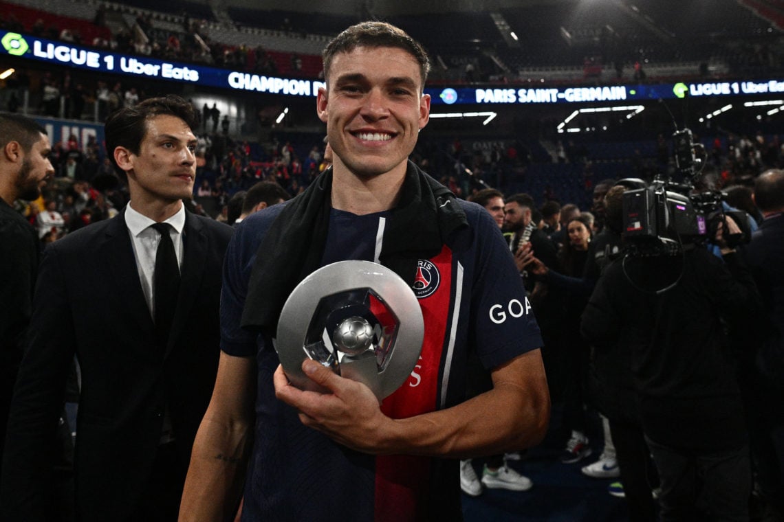 Manuel Ugarte of Paris Saint-Germain celebrates after winning the French Ligue 1 title during a ceremony following the Ligue 1 Uber Eats match betw...