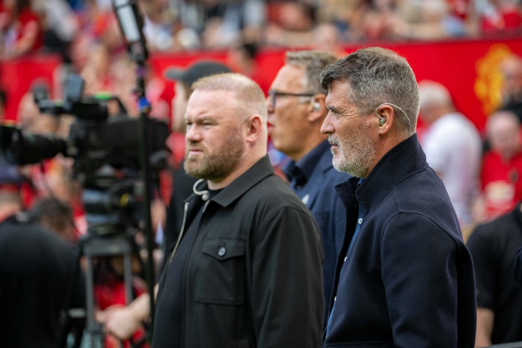 Former Manchester United players and Sky Sports pundits Wayne Rooney and Roy Keane are on the pitch ahead of the Premier League match between Manchester...